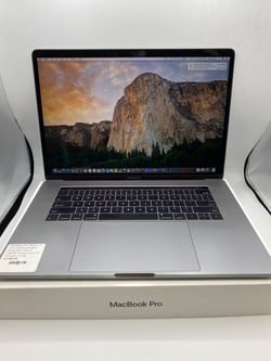 Apple MacBook Pro with Touch Bar space gray 15 inch