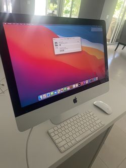 iMac With Keyboard And Mouse