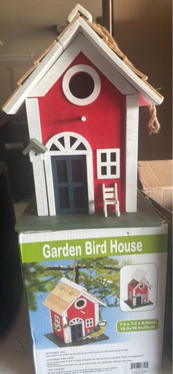 Two bird houses new in box
