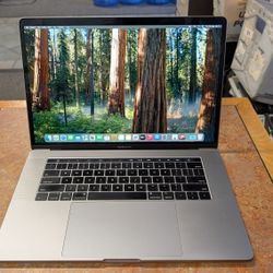 Apple MacBook Pro 15" 2019 Touchbar Six Core i7 16gb 256gb Dual GPU