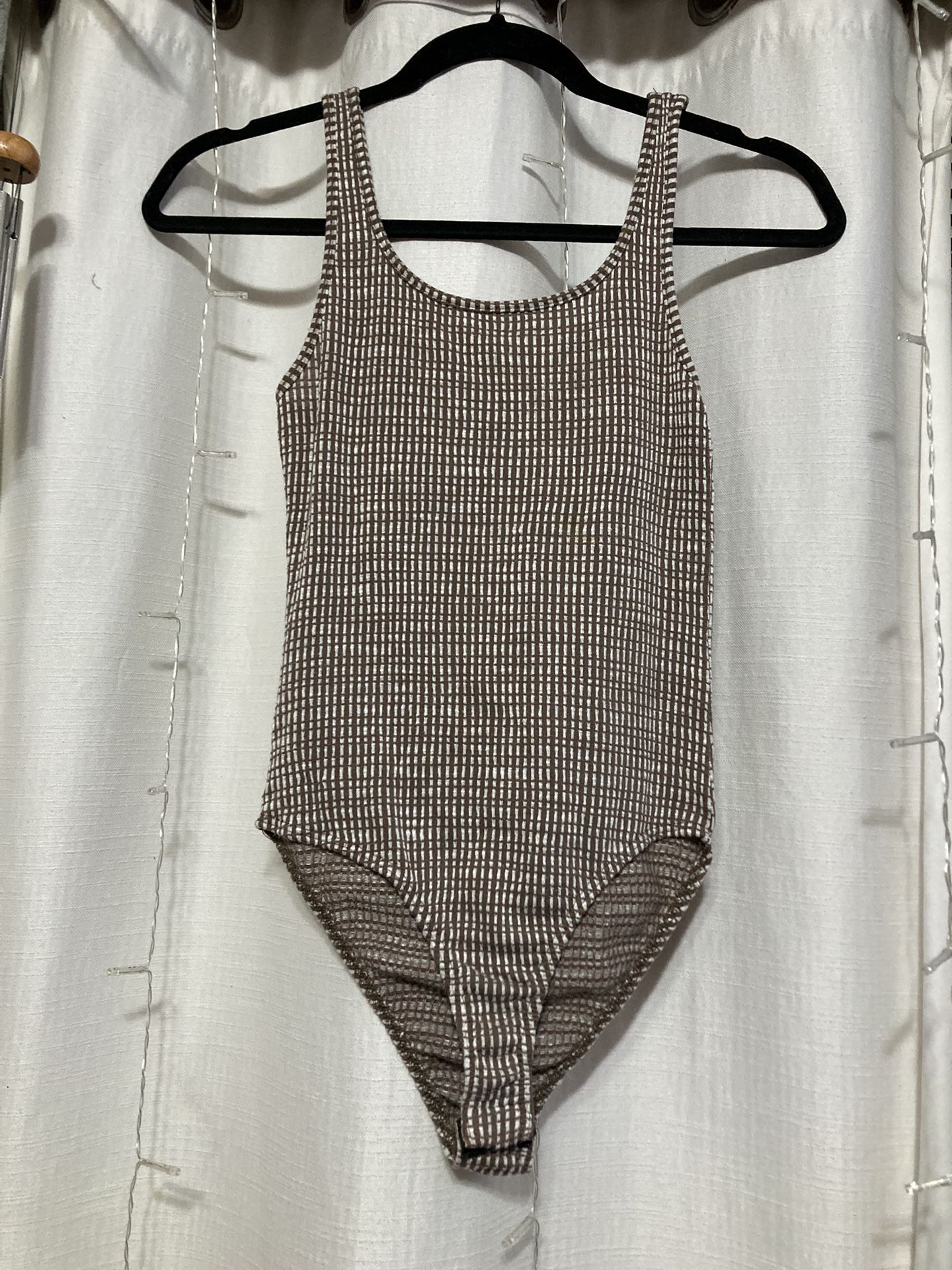 Brown and white bodysuit