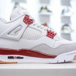 NK SB x Air Jordan AJ4 collaboration in white and red
