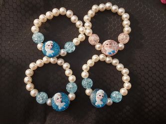 Girls bracelets lot $10 for 4 Frozen Elsa Mermaid Hello Kitty
