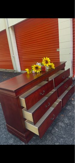 Modern solid wood long dresser with big drawers. Drawer sliding smoothly. Delivery available