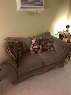 Loveseat sofa 67” long x 33” high with pillows