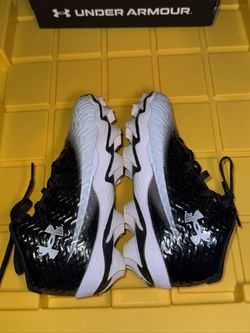Under Armour Spotlight Hammer Jr. Wide football cleats.
