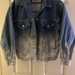 Levi’s faded, indigo and silver denim jacket