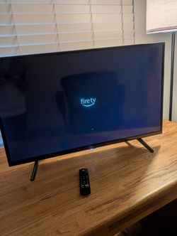 Amazon Fire TV with Fire TV Remote PLUS Wall Mount