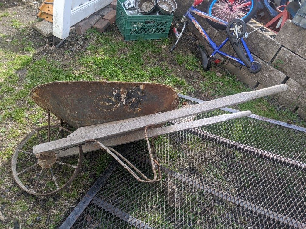 Antique Wheelbarrow Cast iron Wheel