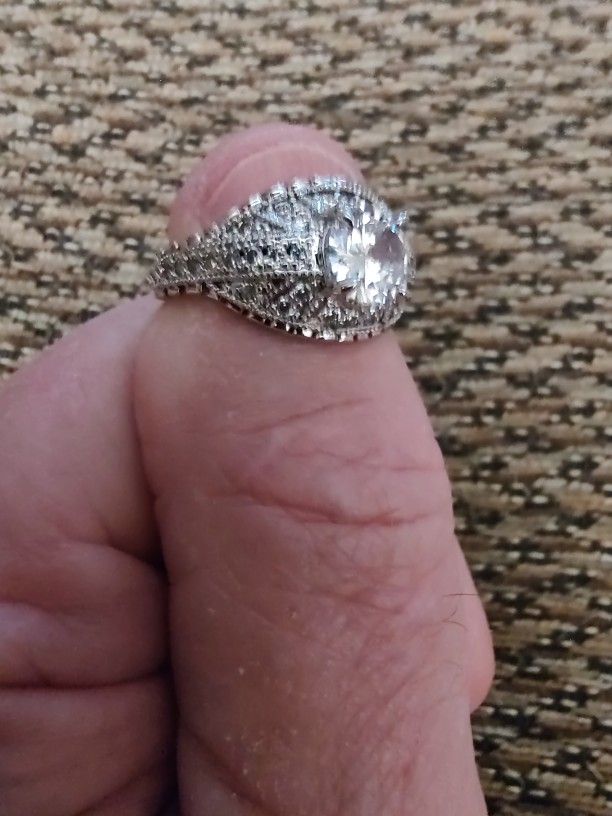 STERLING SILVER CZ RING.  SIZE 7.5. NEW. PICKUP ONLY