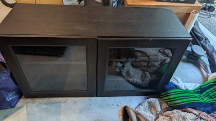 Glass front entertainment cabinet.