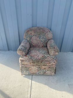 Floral Upholstered Armchair with Skirted Base
