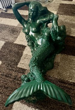 Heavy Vintage Large Dark Green  Mermaid Coffee Table with a glass Top. With Dolphin The mermaid is sculpted in a Reclining pose