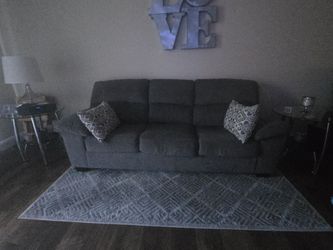 Couch With Two Accent Pillows