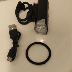 Rechargeable LED Bicycle Front light. Charge chord n strap