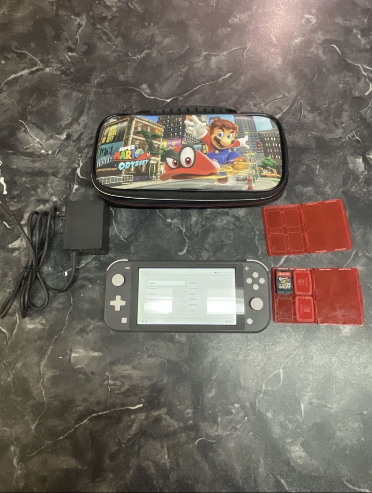 Nintendo Switch Lite with Splatoon 2 game, nintendo charger, carrying case