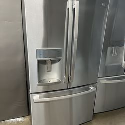 NEW OPEN BOX GE FRENCH STYLE STAINLESS STEEL REFRIGERATOR