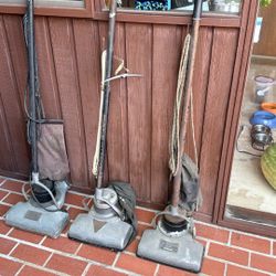 Antique Hoover Vacuum Cleaners. 
