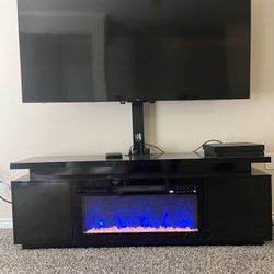 Tv Stand With Built-In Fireplace And Heater brand new with minor corner damage