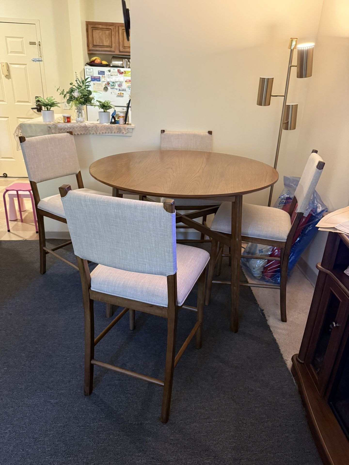 ## For Sale: Beautiful Round Dining Table Set with 4 Chairs - Like New!