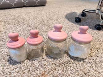 4 pink glass jars