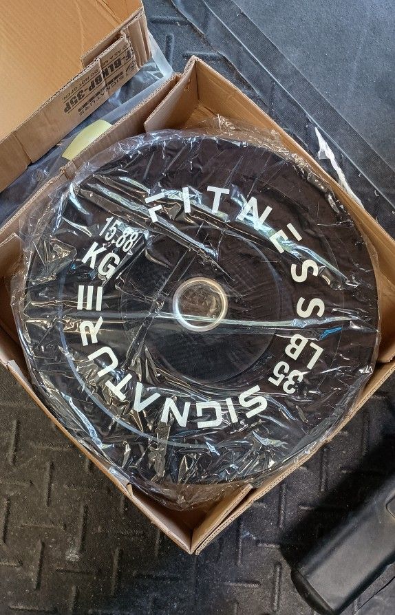 Pair Of 35lb Olympic Bumper Plates (Brand new in box)