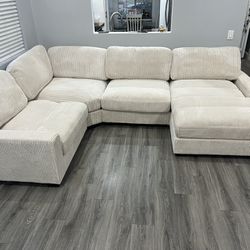 New 4 Piece Modular Sectional.  Off White / Beige.  Corduroy Fabric.  80”x122”x66”.  Free Delivery!