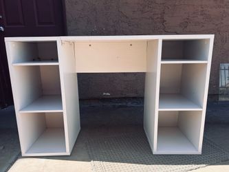 White laminate (faux wood) desk or entertainment center however desired to be used