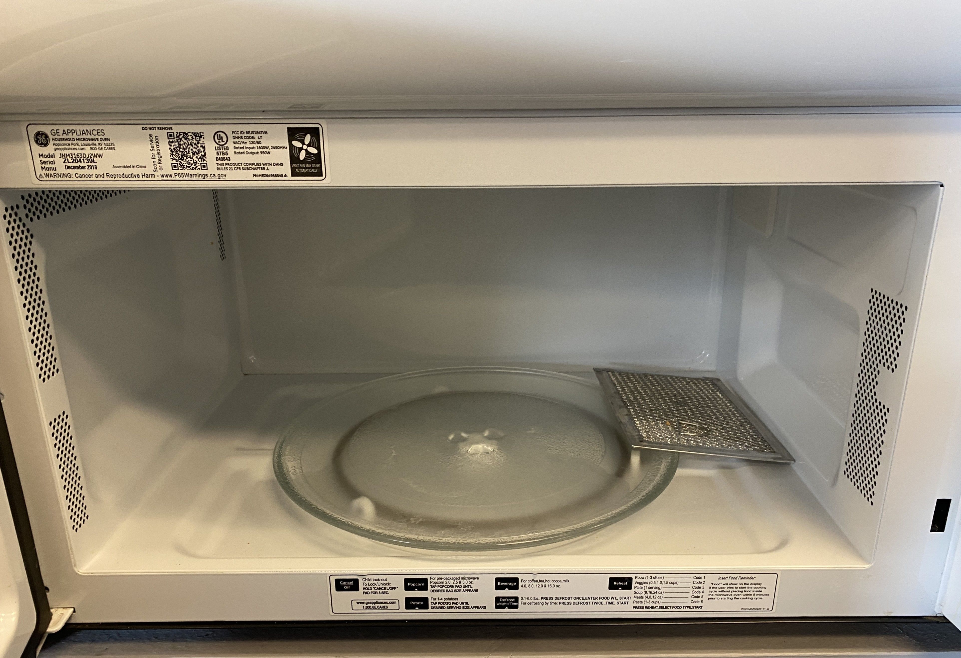 White GE Over The Range Microwave (8 0014)