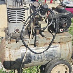 Air compressor with wheels