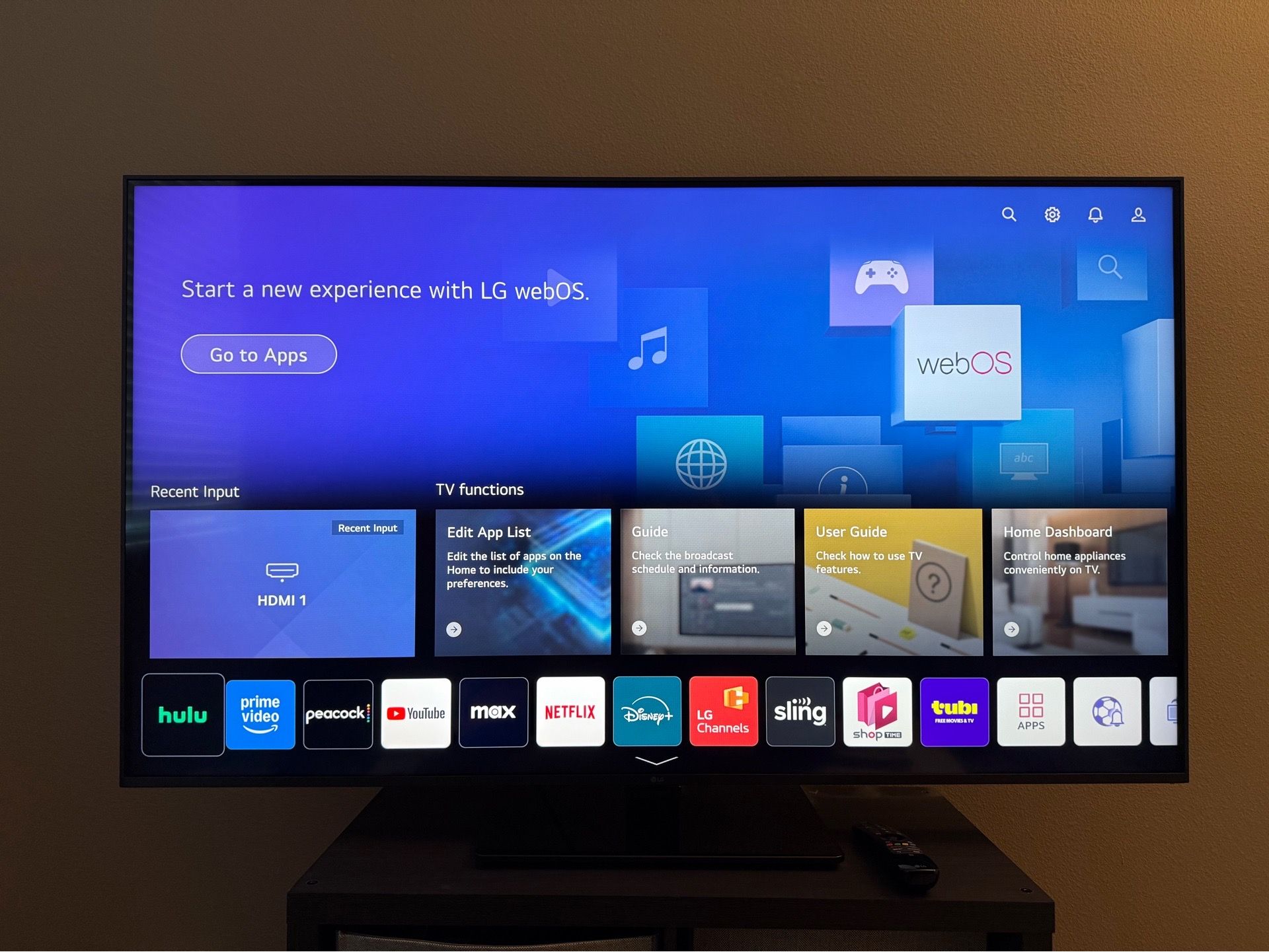 LG 55” 4K UHD Smart TV + Premium Swivel Stand - $165