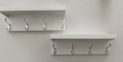 White coat hooks with shelves