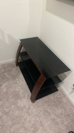 Black glass TV stand