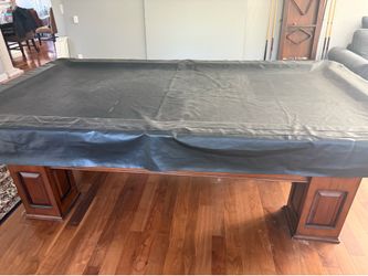Pool Table with tennis table topper and wooden wall rack