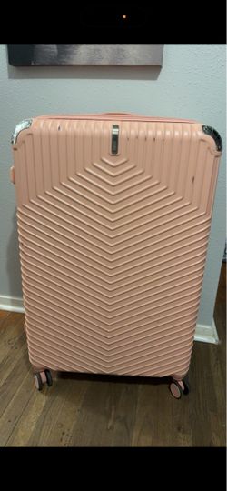 Extra large pink suitcase