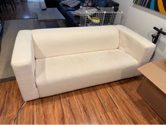 white/cream fabric loveseat