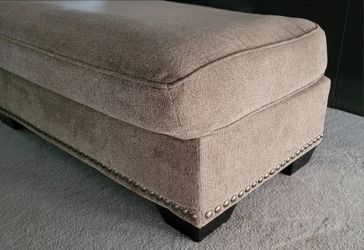 Extra Long Brown Nail Head Trim Ottoman! Pre-Owned and in Very Good Condition! Aahley Furniture! NO Stains, Pet Free & Smoke Free!