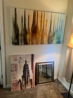 Beautiful wall pictures and wall mirror.