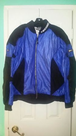 Teknic motorcycle jacket with pads in back arms, and shoulders. ..size xl mens...good condition!