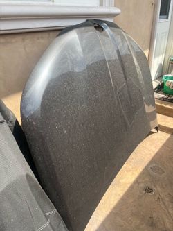 2025 IX aluminum Hood  has a small dent  original price $1500