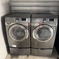 Gray Samsung Washer And Electric Dryer Matching Set With Pedestals