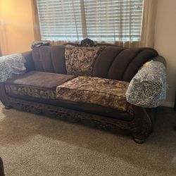 Free sofa and loveseat, arms damage
