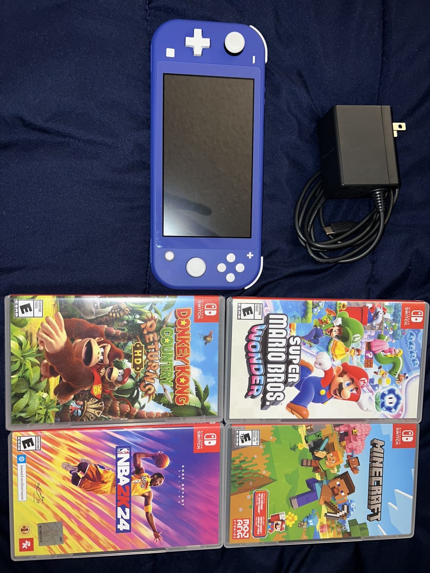 Purple Nintendo Switch Light With Games