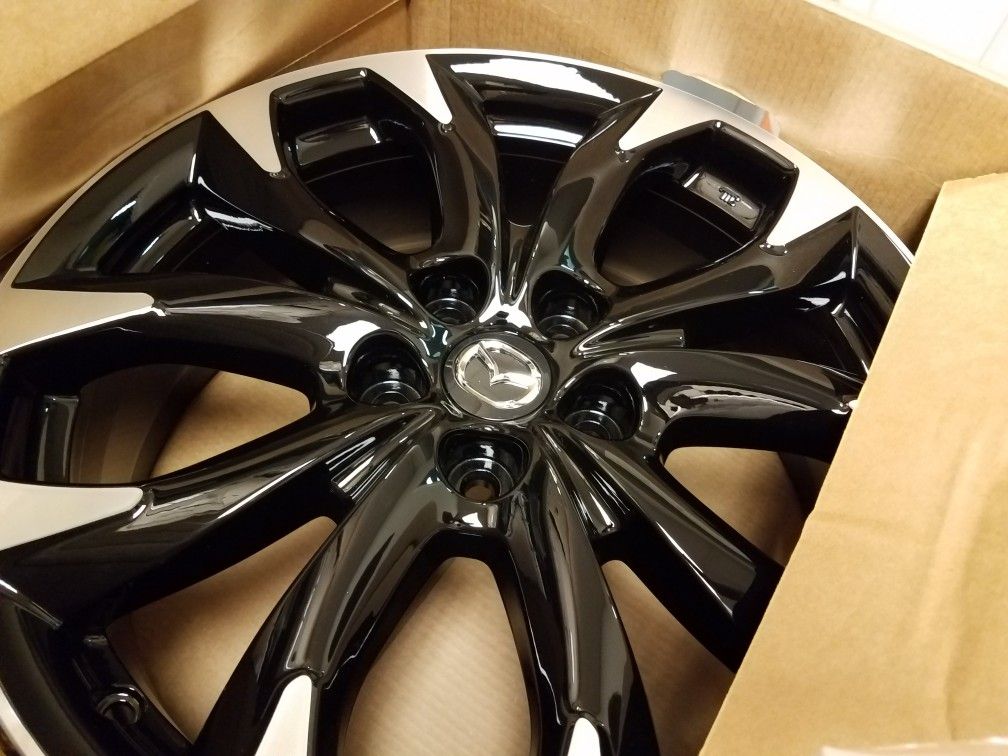 Wheel pro Set of 4 -19 inch Mazda wheels freshly refinished in black powder coat with machine face