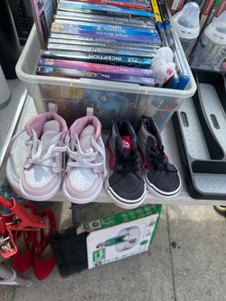 Baby shoes, blue vans $5  & pink Nikes $10