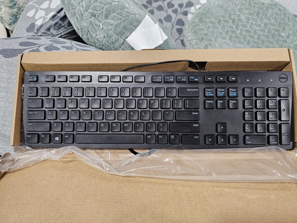 New, never used slim wired full size keyboard.
