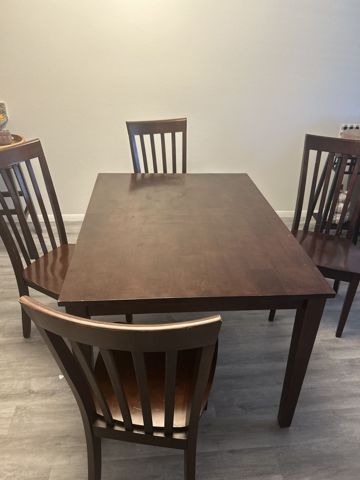 Wooden Table And Four Chairs