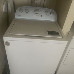 A Whirlpool Washer And A Kenmore Dryer.