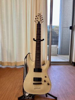 White Electric Schecter Guitar