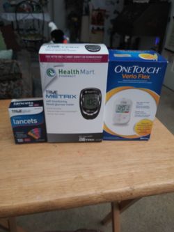 Health Mart and One Touch glucose monitor meter.